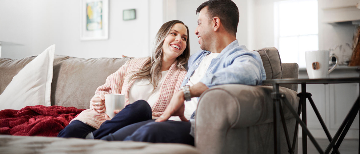 Homeowners enjoying forced air heating system