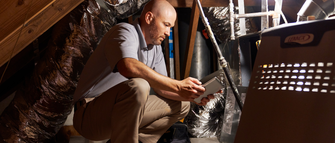 Dealer inspecting a heat pump that is not turning on