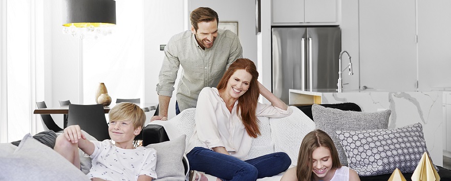 Family relaxing and enjoying a clean air home after going through a deep spring-cleaning checklist.