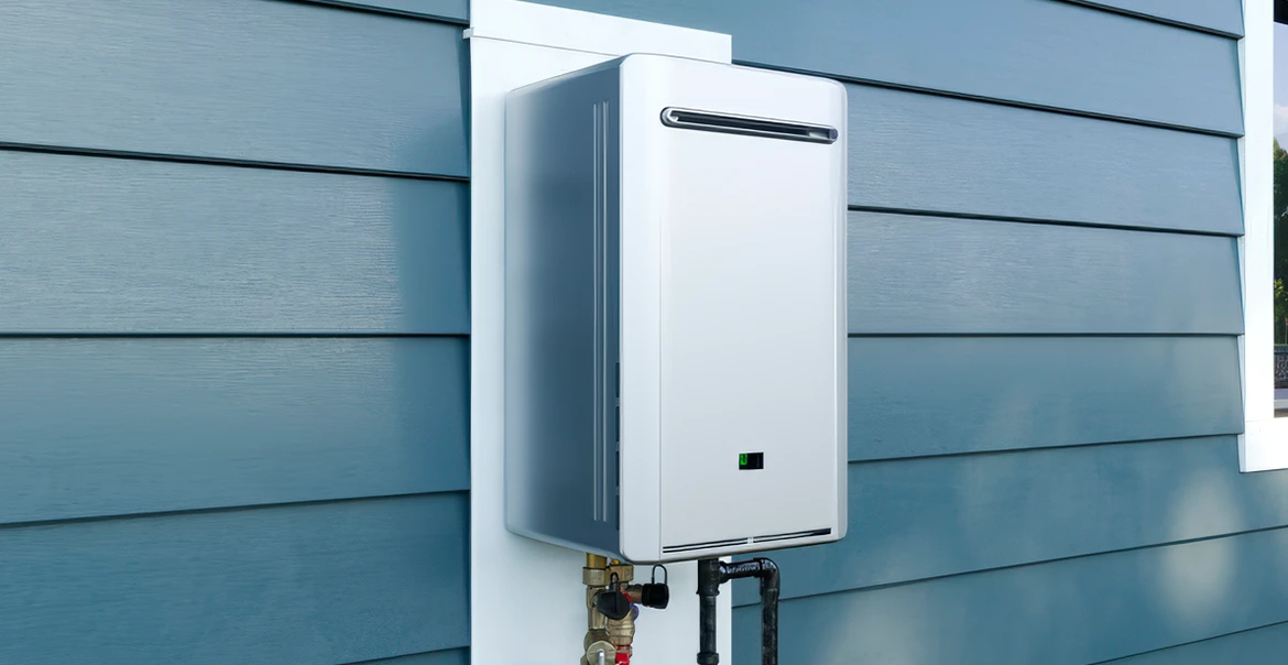 Wall-mounted combi boiler installed outdoors on house siding